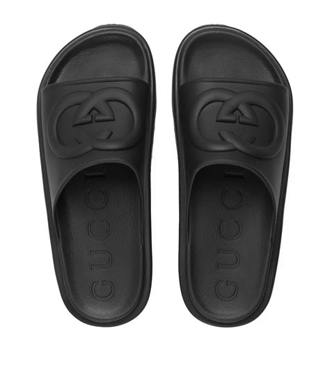 interlocking g gucci slides.